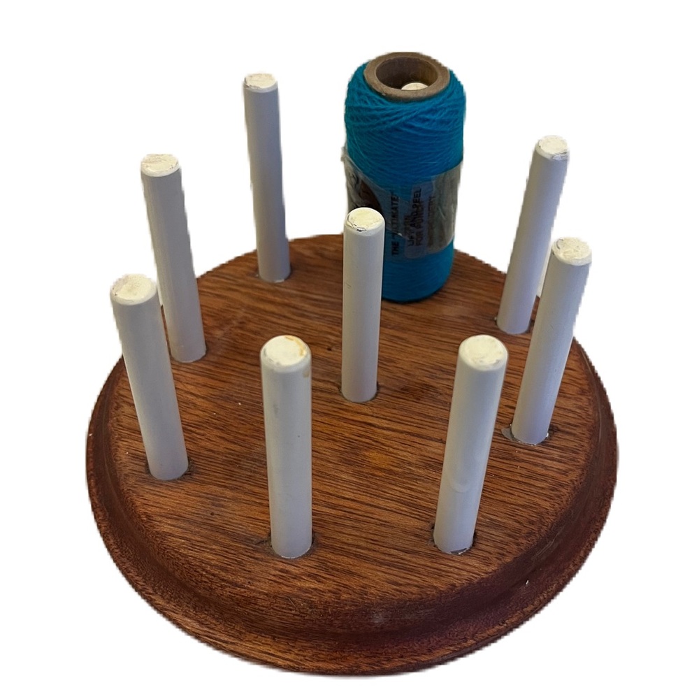 Punch needling yarn holder